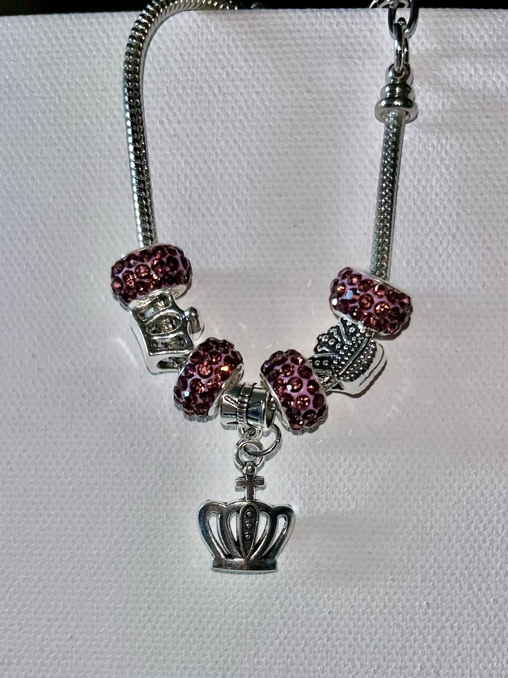 Silver Charm Bracelet with Purple Crystal Rondelle Beads and Crown Charm